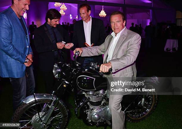 Arnold Schwarzenegger attends "The Expendables 3" private dinner and party at Gotha Night Club at Palm Beach on May 18, 2014 in Cannes, France.