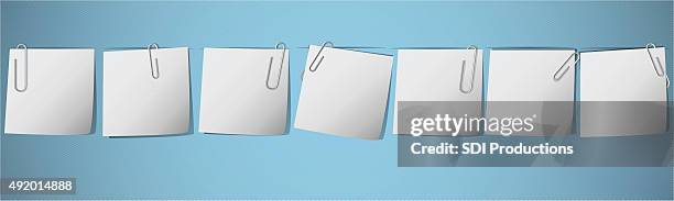 blank weekly notes with paperclips - bulldog clip stock illustrations