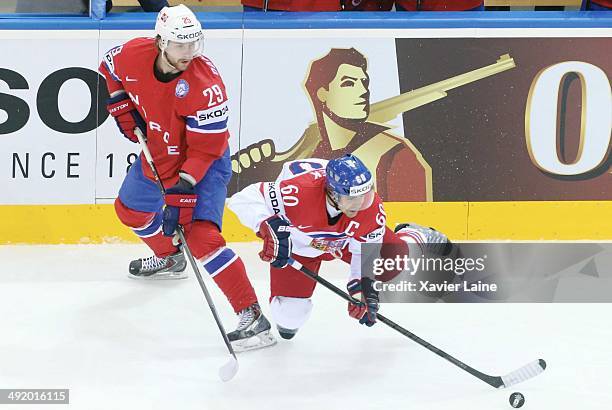 Robin Dahlstrom of Norway and captain Tomas Rolinek of Czech Republic in action during the 2014 IIHF World Championship between Czech Republic and...