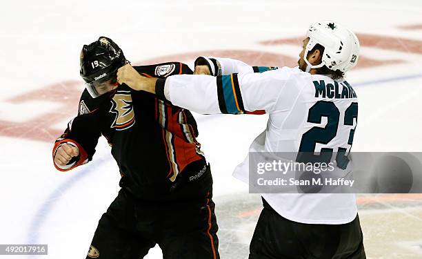 Patrick Maroon of the Anaheim Ducks and Frazer McLaren of the San Jose Sharks fight in the third period of a preseason game at Honda Center on...