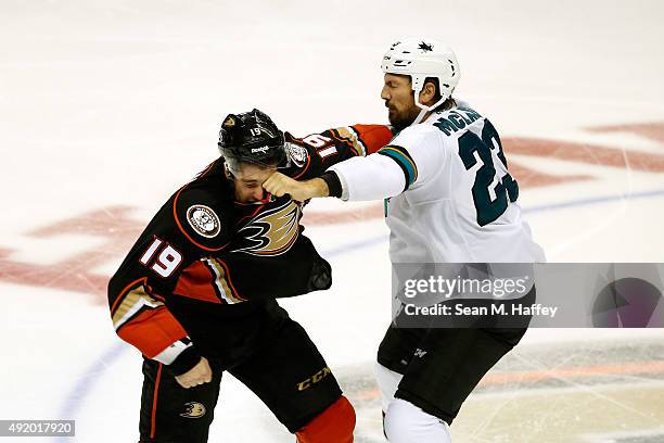 Patrick Maroon of the Anaheim Ducks and Frazer McLaren of the San Jose Sharks fight during the third period in a pre season game at Honda Center on...