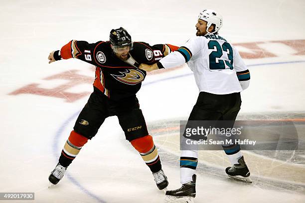 Patrick Maroon of the Anaheim Ducks and Frazer McLaren of the San Jose Sharks fight in the third period of a preseason game at Honda Center on...