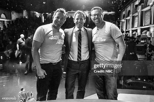 Episode 272 -- Pictured: Baseball analyst, Sean Casey and Kevin Millar with host Seth Meyers during a commercial break on October 8, 2015 --