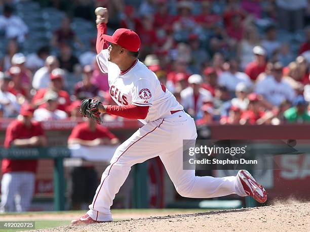 Reliever Ernesto Frieri of the Los Angeles Angels of Anaheim throws a pitch in the ninth inning against the Tampa Bay Rays at Angel Stadium of...