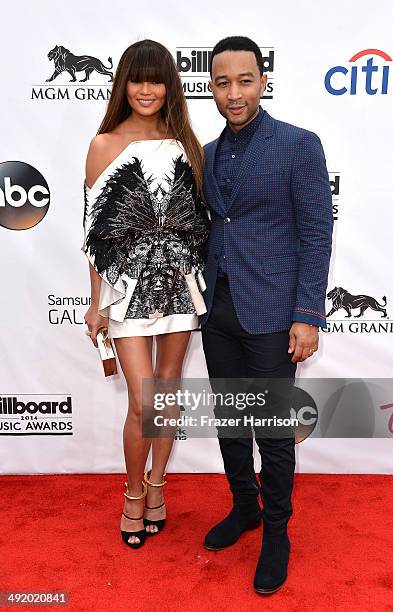 Model Christine Teigen and musician John Legend attend the 2014 Billboard Music Awards at the MGM Grand Garden Arena on May 18, 2014 in Las Vegas,...