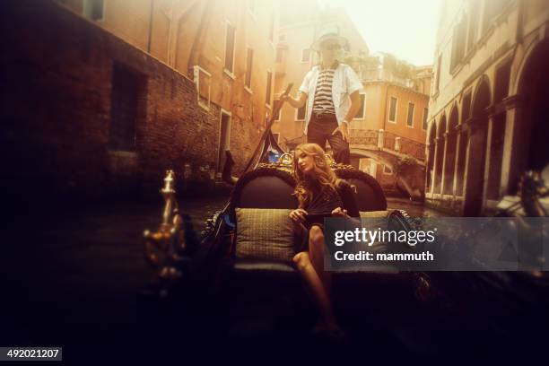 young woman in gondola, venice - gondolier stock pictures, royalty-free photos & images