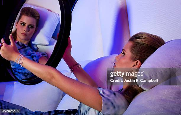 Actress Claire Holt is photographed for Just Jared on December 17, 2013 in Los Angeles, California.