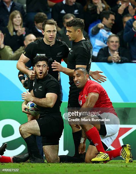 Nehe Milner-Skudder of the New Zealand All Blacks scores their third try during the 2015 Rugby World Cup Pool C match between New Zealand and Tonga...