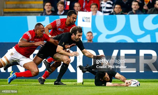 Nehe Milner-Skudder of the New Zealand All Blacks scores their fourth try during the 2015 Rugby World Cup Pool C match between New Zealand and Tonga...