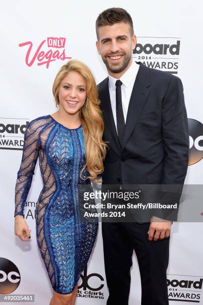 Singer-songwriter Shakira and professional soccer player Gerard Pique attend the 2014 Billboard Music Awards at the MGM Grand Garden Arena on May 18,...