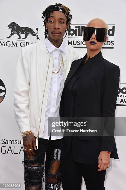 Rapper Wiz Khalifa and model Amber Rose attend the 2014 Billboard Music Awards at the MGM Grand Garden Arena on May 18, 2014 in Las Vegas, Nevada.