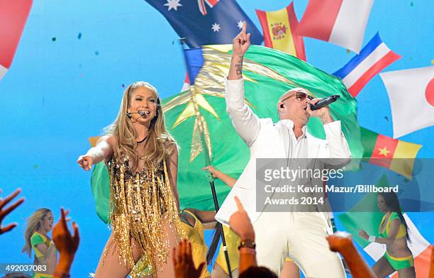 Singers Jennifer Lopez and Pitbull perform onstage during the 2014 Billboard Music Awards at the MGM Grand Garden Arena on May 18, 2014 in Las Vegas,...