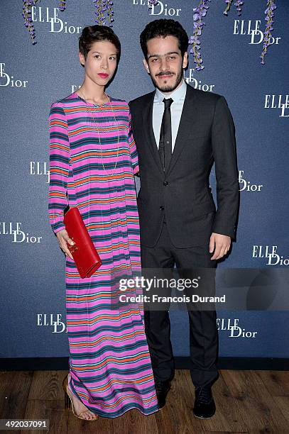 Guests attend the Dior & ELLE Magazine Dinner at the 67th Annual Cannes Film Festival at Albane by Costes, JW Marriott Rooftop on May 18, 2014 in...