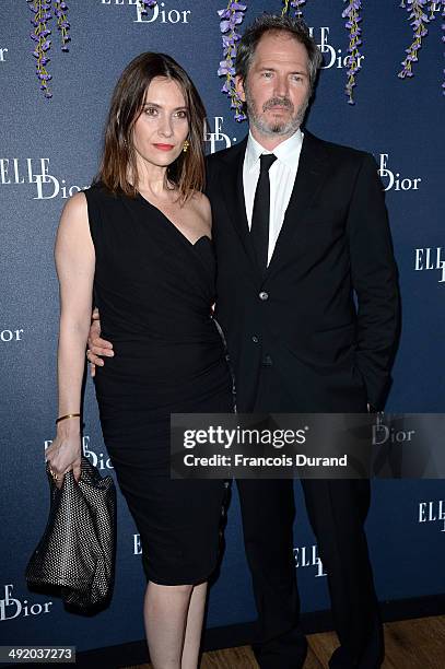 Geraldine Pailhas and Christopher Thompson attend the Dior & ELLE Magazine Dinner at the 67th Annual Cannes Film Festival at Albane by Costes, JW...