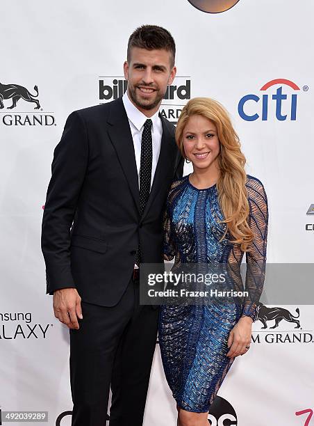 Singer Shakira and soccer player Gerard Pique attend the 2014 Billboard Music Awards at the MGM Grand Garden Arena on May 18, 2014 in Las Vegas,...