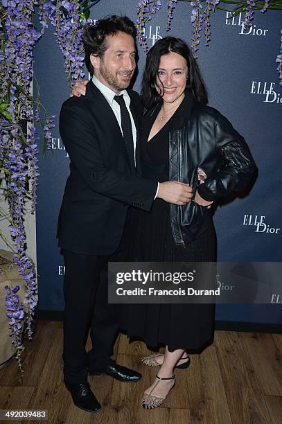 Actor Edouard Baer and guest attend the Dior & ELLE Magazine Dinner at the 67th Annual Cannes Film Festival at Albane by Costes, JW Marriott Rooftop...