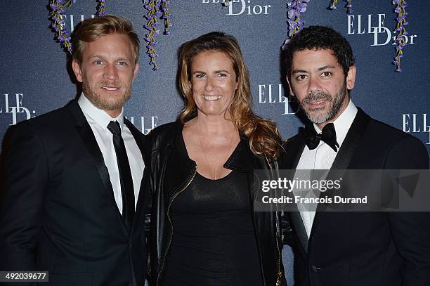 Jeremie Renier, a guest and Manu Payet attend the Dior & ELLE Magazine Dinner at the 67th Annual Cannes Film Festival at Albane by Costes, JW...