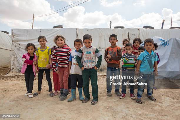 syrian refugee children - refugee camp stock pictures, royalty-free photos & images