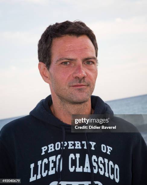 Former Societe General trader Jerome Kerviel poses for a photo on his way to the French border to surrender to police on May 18, 2014 in Menton,...