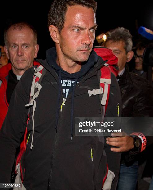 Former Societe General trader Jerome Kerviel surrenders to police at the French border on May 18, 2014 in Menton, France. Kerviel, convicted of one...