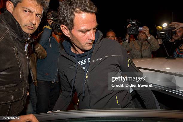 Former Societe General trader Jerome Kerviel surrenders to police at the French border on May 18, 2014 in Menton, France. Kerviel, convicted of one...