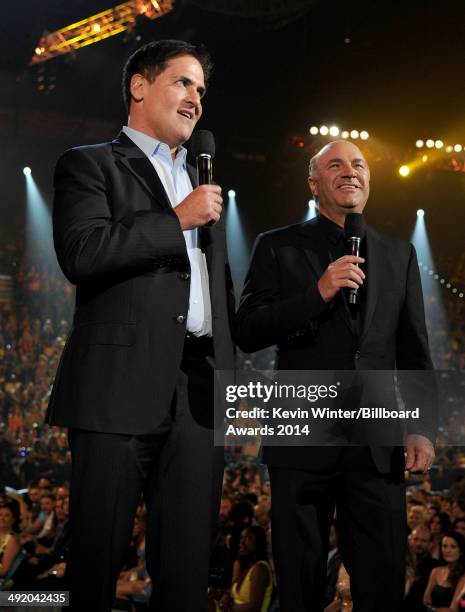 Businessmen/TV personalities Mark Cuban and Kevin O'Leary speak onstage during the 2014 Billboard Music Awards at the MGM Grand Garden Arena on May...