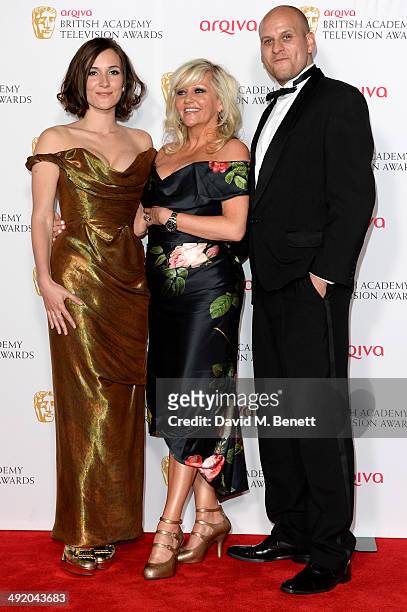 Sarah Solemani and Camille Coduri with Ricky Champ attends the Arqiva British Academy Television Awards at Theatre Royal on May 18, 2014 in London,...