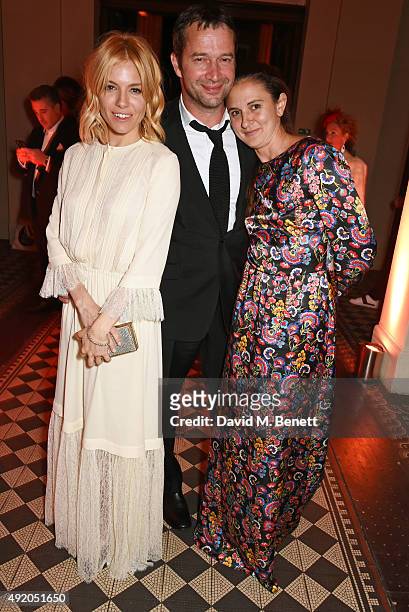 Sienna Miller, James Purefoy and Jessica Adams attend Eva Cavalli's birthday party at One Mayfair on October 9, 2015 in London, England.