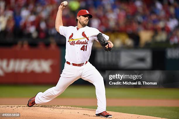 John Lackey of the St. Louis Cardinals throws a pitch in the first inning against the Chicago Cubs during game one of the National League Division...