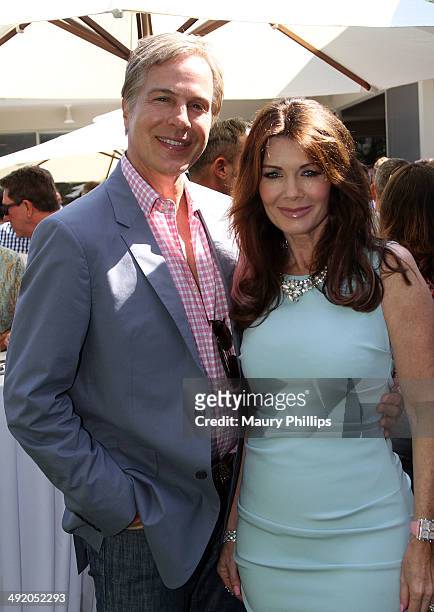 Lisa Vanderpump and guest attend the Trevor Project Garden Party on May 18, 2014 in Beverly Hills, California.