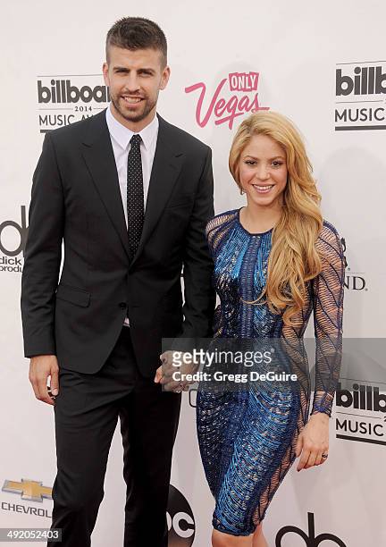 Singer Shakira and Gerard Pique arrive at the 2014 Billboard Music Awards at the MGM Grand Garden Arena on May 18, 2014 in Las Vegas, Nevada.