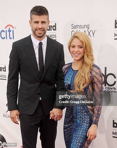 Singer Shakira and Gerard Pique arrive at the 2014 Billboard Music Awards at the MGM Grand Garden Arena on May 18, 2014 in Las Vegas, Nevada.