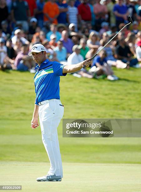 Gary Woodland reacts to a birdie putt on the 18th hole during the final round of the HP Byron Nelson Championship at the TPC Four Seasons on May 18,...