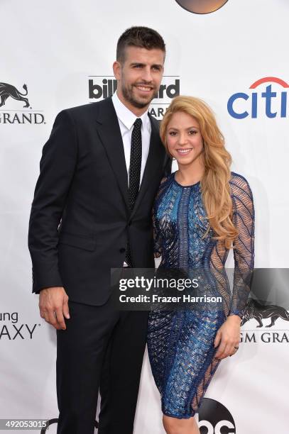 Singer Shakira and soccer player Gerard Pique attend the 2014 Billboard Music Awards at the MGM Grand Garden Arena on May 18, 2014 in Las Vegas,...