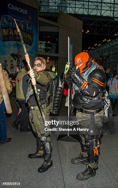 Fans pose at day 2 of New York Comic-Con at The Jacob K. Javits Convention Center on October 9, 2015 in New York City.