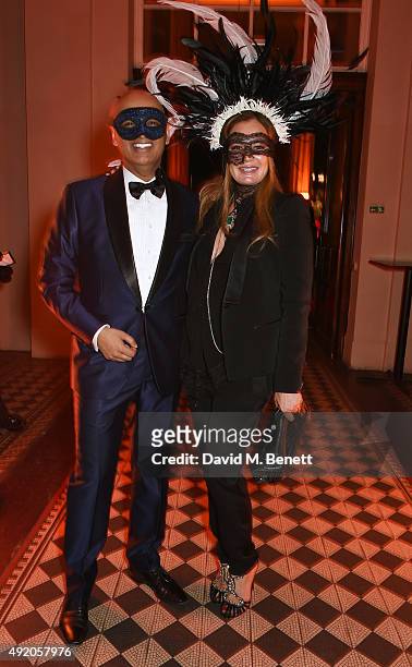 Tariq Khan and Eva Cavalli attend Eva Cavalli’s birthday dinner party at One Mayfair on October 9, 2015 in London, England.