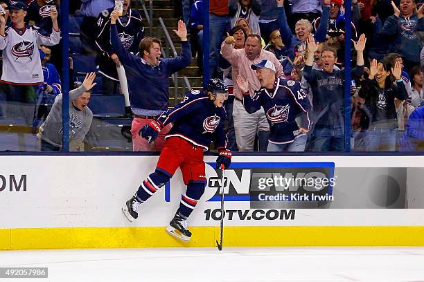 Cam Atkinson of the Columbus Blue Jackets celebrates after beating Henrik Lundqvist of the New York Rangers for a goal during the second period on...