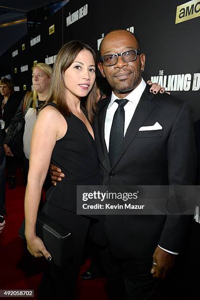 Elizabeth Rodriguez and Lennie James attend AMC's "The Walking Dead" season 6 fan premiere event at Madison Square Garden on October 9, 2015 in New...