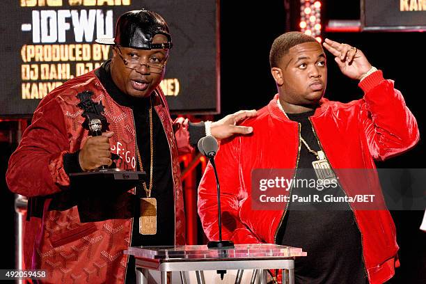 Rapper E-40 and DJ Mustard speak onstage at the BET Hip Hop Awards Show 2015 at the Atlanta Civic Center on October 9, 2015 in Atlanta, Georgia.