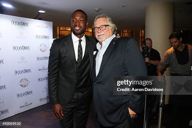 Dwyane Wade Micky Arison attend Ocean Drive Magazine celebrates its October mens issue with Dwyane Wade at StripSteak by Michael Mina at...