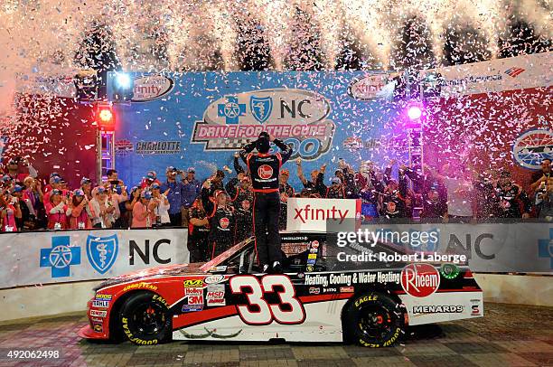 Austin Dillon, driver of the Rheem Chevrolet, celebrates in victory lane after winning the NASCAR XFINITY Series Drive for the Cure 300 at Charlotte...