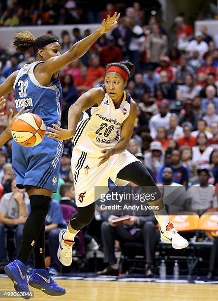 Briann January of the Indiana Fever passes the ball against the Minnesota Lynx during Game Three of the 2015 WNBA Finals at Bankers Life Fieldhouse...