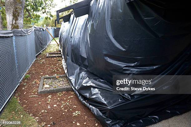 Black plastic tarp covers Snyder Hall on the Umpqua Community College Campus on October 9, 2015 in Roseburg, Oregon. Snyder Hall is where a gunman...