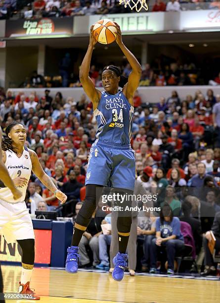 Sylvia Fowles of the Minnesota Lynx grabs a rebound against the Indiana Fever during Game Three of the 2015 WNBA Finals at Bankers Life Fieldhouse on...