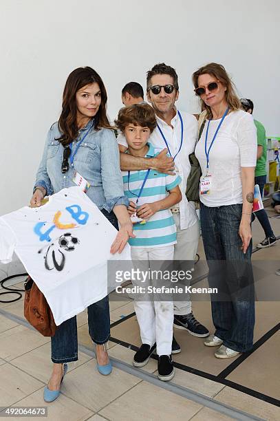 Jeanne Tripplehorn, Leland Orser, August Orser and Lena Wald attend Hammer Museum K.A.M.P. 2014 on May 18, 2014 in Los Angeles, California.