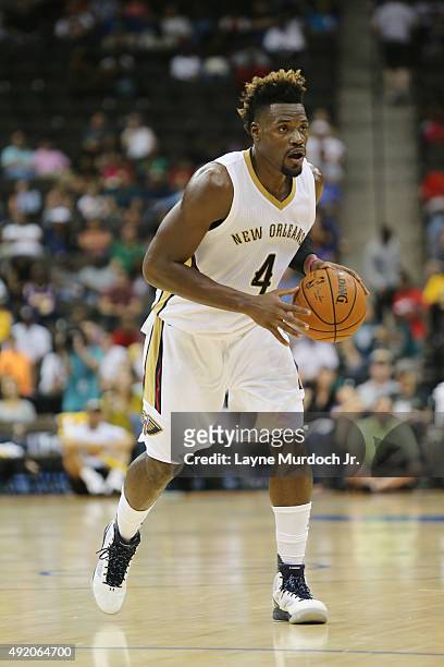 Jeff Adrien of the New Orleans Pelicans handles the ball against the Atlanta Hawks during a preseason game on October 9, 2015 at the Jacksonville...