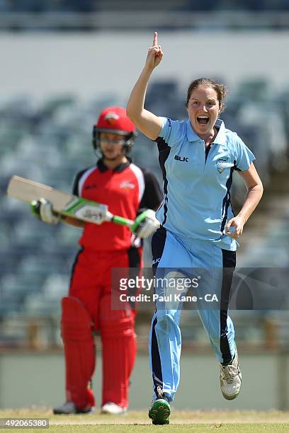 Rene Farrell of New South Wales celebrates thw dismissal of Tegan McPharlin of South Australia during the round one WNCL match between New South...