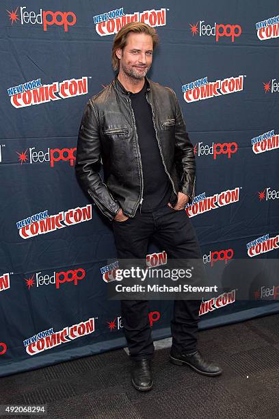 Actor Josh Holloway poses in the press room for the "Colony" panel during New York Comic-Con Day 2 at The Jacob K. Javits Convention Center on...