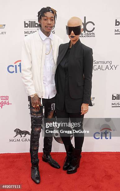 Amber Rose and Wiz Khalifa arrive at the 2014 Billboard Music Awards at the MGM Grand Garden Arena on May 18, 2014 in Las Vegas, Nevada.