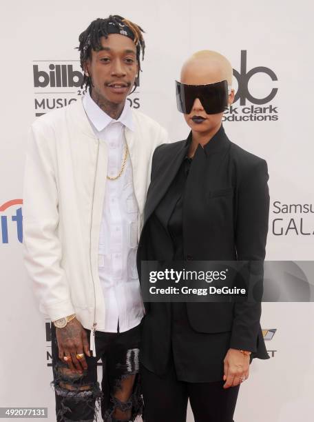 Amber Rose and Wiz Khalifa arrive at the 2014 Billboard Music Awards at the MGM Grand Garden Arena on May 18, 2014 in Las Vegas, Nevada.